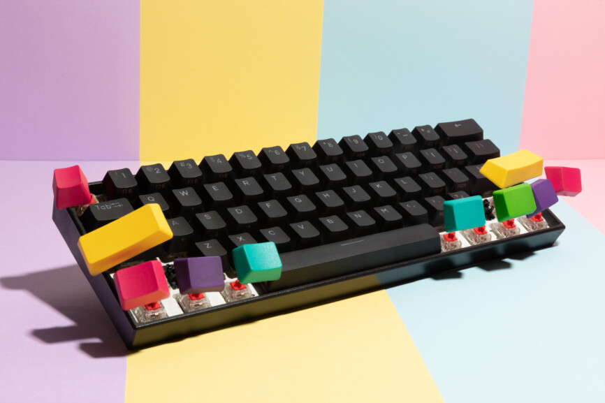 Colourful computer keyboard with multiple flying color keys